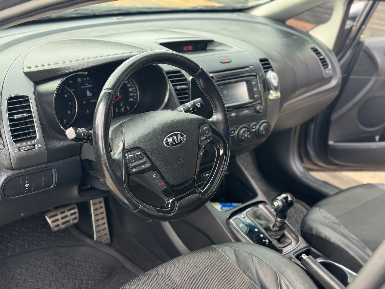 KIA Cerato 5 — foto 12 de 16